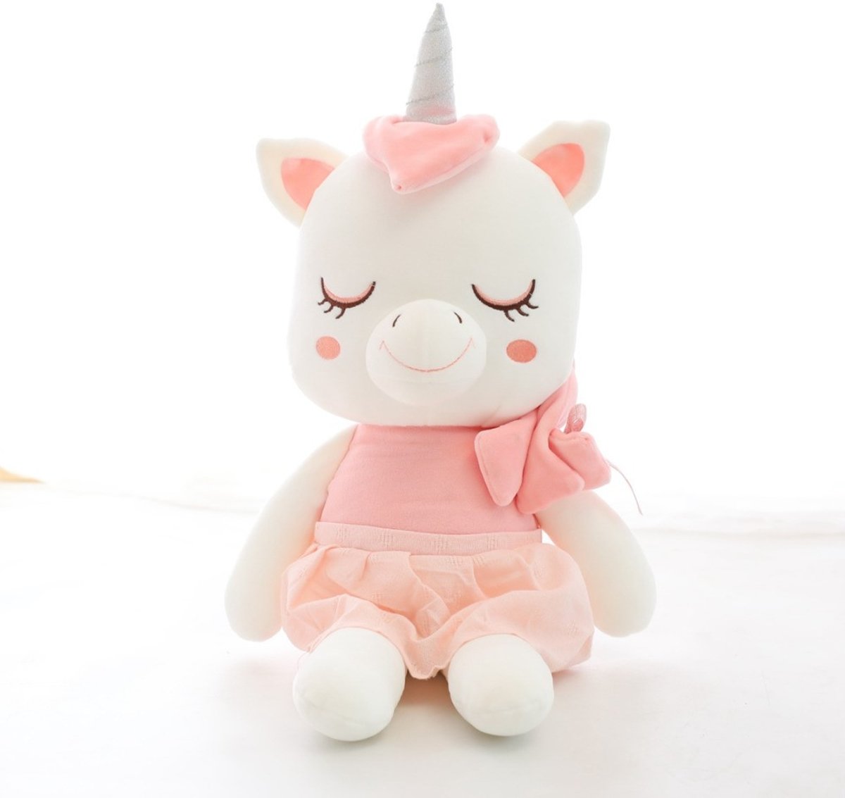 Zacht plush Unicorn roze knuffel met roze jurkje, prachtige vlecht & zilverkleurige hoorn | Decoratie  kinderkamer